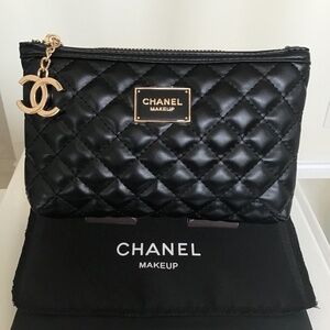CHANEL black quilted faux leather makeup bag with CC logo hardware + storage bag
